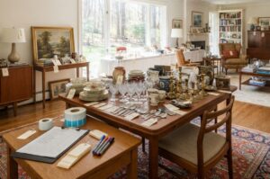 Estate belongings organized for professional pricing before sale begins